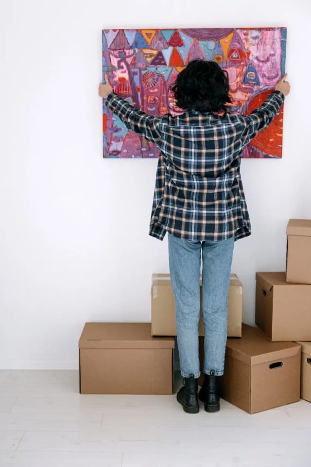 Hang a piece of inspirational wall art