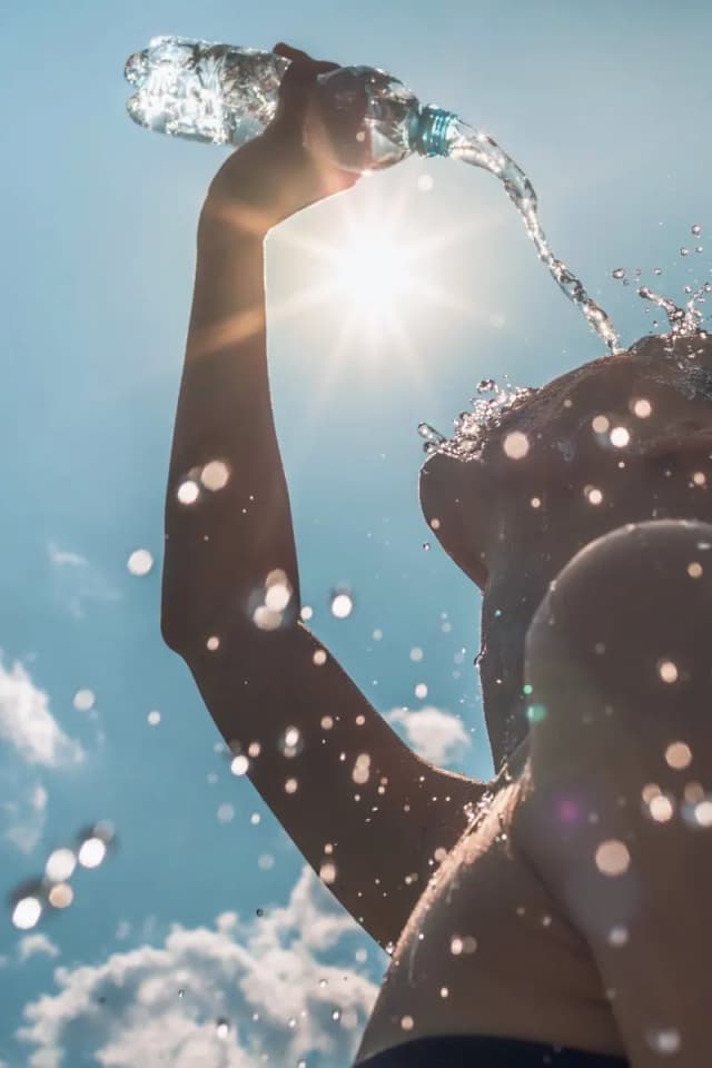 Splash others with water